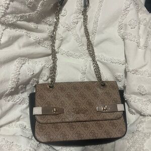 Brown and gold guess purse